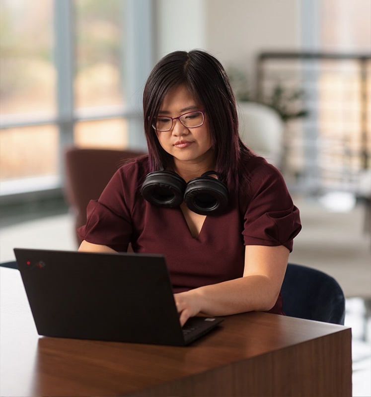 woman-on-laptop-with-headphones-cropped